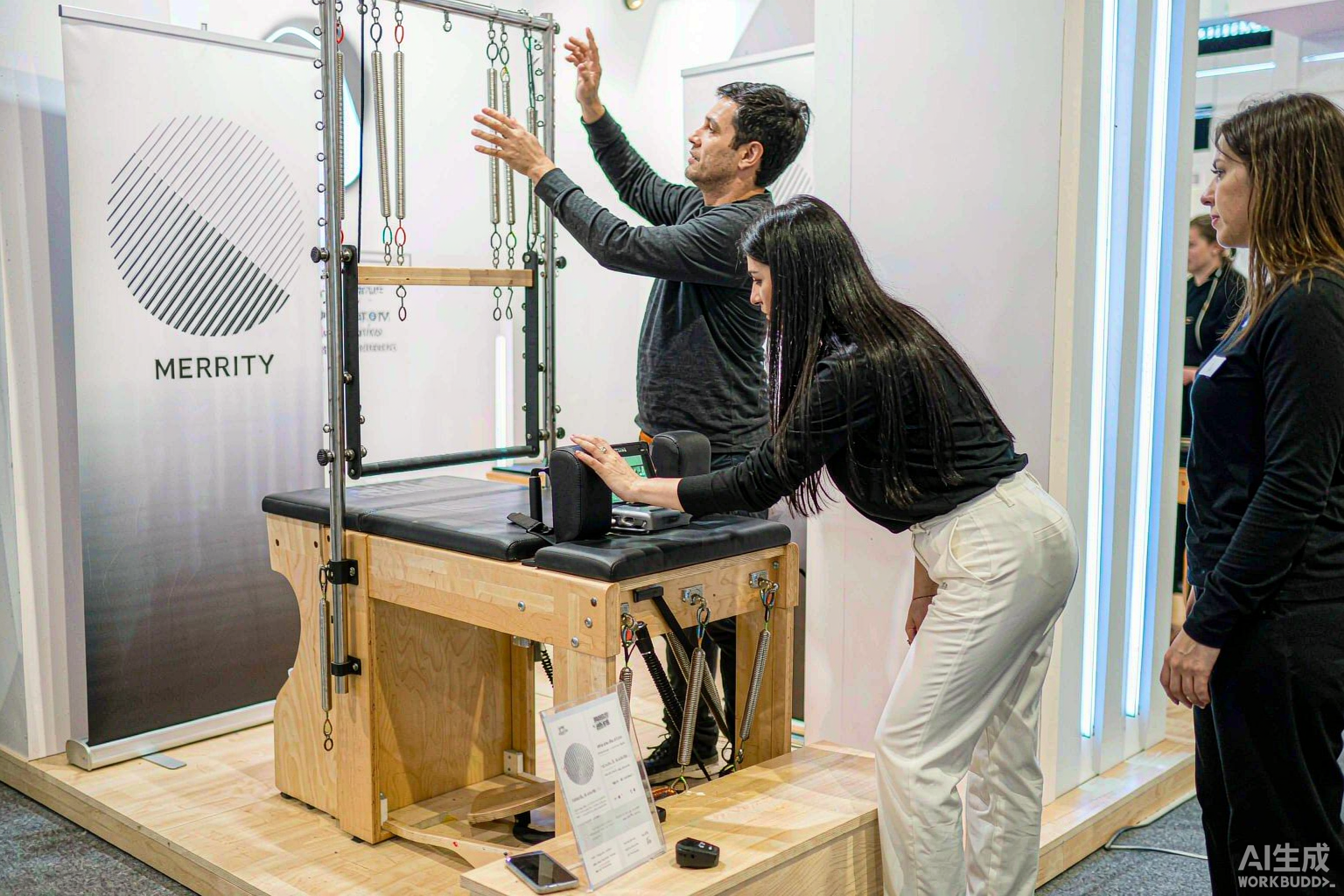 Visitors reviewing Pilates equipment at the KANDO booth